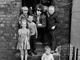 Bob Dylan, Kids on steps, Liverpool, 1966. by BARRY FEINSTEIN