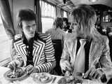Bowie, Ronson Lunch On Train To Aberdeen, UK, 1973 by MICK ROCK